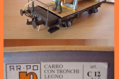 c 12 carro con tronchi legno